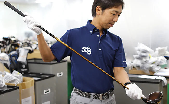 step 6 grabbing the grip and club head